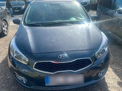 Second-hand Kia Ceed Sportswagon 136 CP (100 kW) 2014 Gri Break
