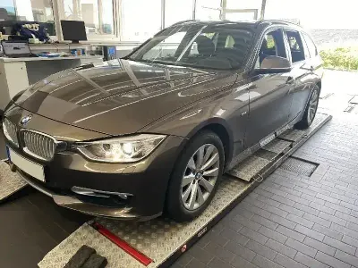 Używany BMW 320 Comfort Edition 184 KM (135 kW) 2013 Brązowy Kombi