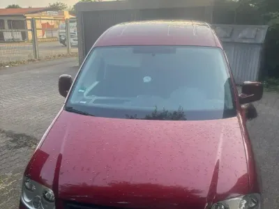 Second-hand VW Caddy Family 80 CP (58 kW) 2007 Roșu Monovolum