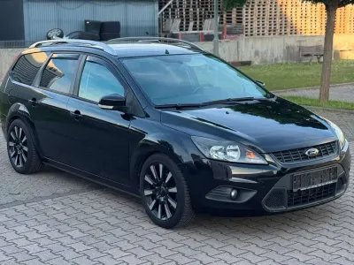 Gebraucht Ford Focus 101 PS (74 kW) 2010 Schwarz Kombi