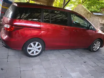 Gebraucht Mazda 5 115 PS (84 kW) 2013 Rot Van / Kleinbus