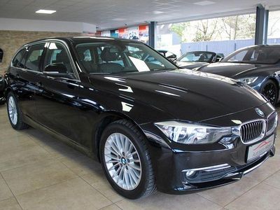 Second-hand BMW 320 Comfort Edition 184 CP (135 kW) 2012 Negru Break