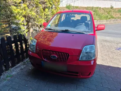 Second-hand Kia Picanto 60 CP (44 kW) 2007 Roșu Hatchback