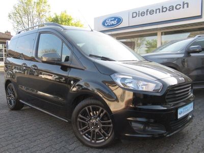 gebraucht Ford Tourneo Courier Sport 8-fach bereift+Navi+Winter