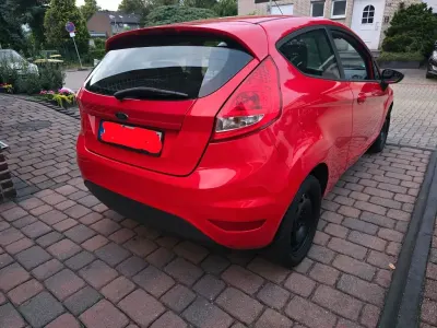 Gebraucht Ford Fiesta Trend 60 PS (44 kW) 2009 Rot Limousine