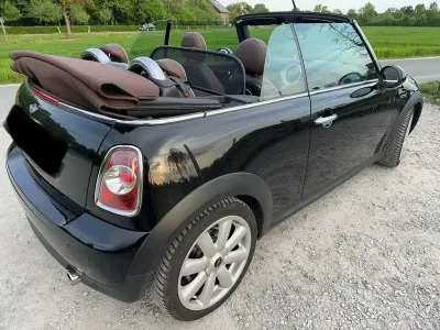 Käytetty Mini Cooper Cabriolet 122 HP (89 kW) 2011 Musta Avoauto