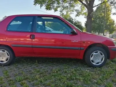Gebraucht Peugeot 106 60 PS (44 kW) 1997 Rot Kleinwagen