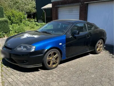 Gebraucht Hyundai Coupé 143 PS (105 kW) 2006 Schwarz Coupé