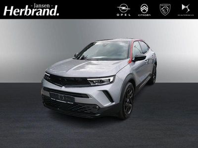 Gebraucht Opel Mokka-e GS Line 100 kW (136 PS) 2022 Kontrast grau/quarz silber SUV