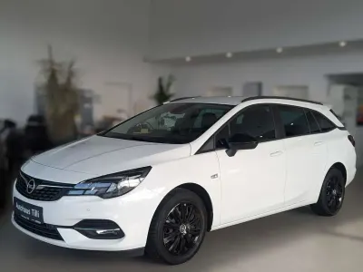Używany Opel Astra Business 122 KM (89 kW) 2021 Biały Kombi