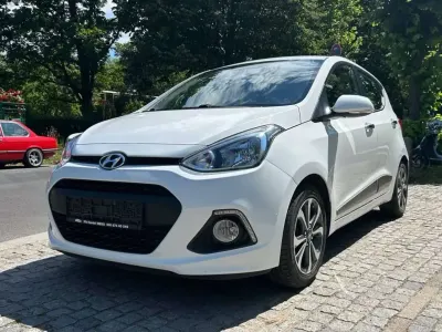 Gebraucht Hyundai i10 Style 87 PS (63 kW) 2015 Polar white / sol Kleinwagen