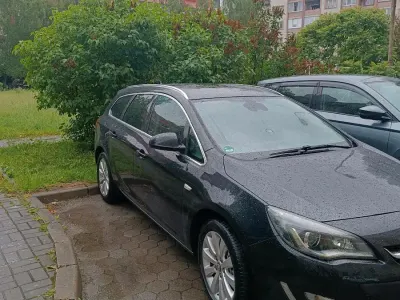 Gebraucht Opel Astra 165 PS (121 kW) 2014 Schwarz Kombi