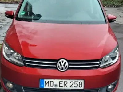 Gebraucht VW Touran 140 PS (102 kW) 2013 Rot Van / Kleinbus