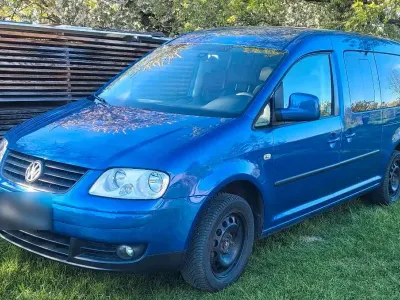 Second-hand VW Caddy Maxi 105 CP (77 kW) 2009 Albastru Monovolum