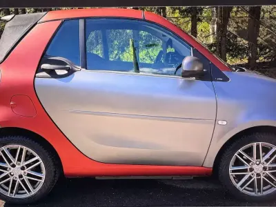 Gebraucht Smart ForTwo Cabrio Brabus 90 PS (66 kW) 2019 Sicherheitszelle matt orange Cabrio