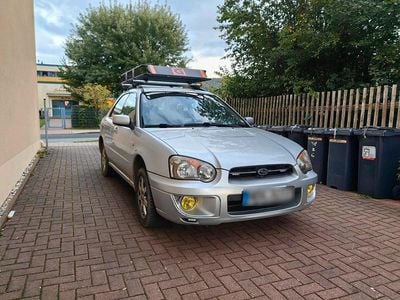 Second-hand Subaru Impreza 125 CP (91 kW) 2004 Argintiu Break