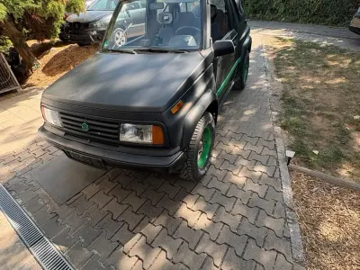 Gebraucht Suzuki Vitara 80 PS (58 kW) 1989 Schwarz Cabrio