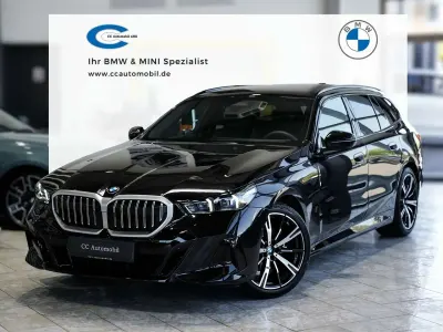 Gebraucht BMW 520 M Sport 197 PS (144 kW) 2025 Saphirschwarz Kombi