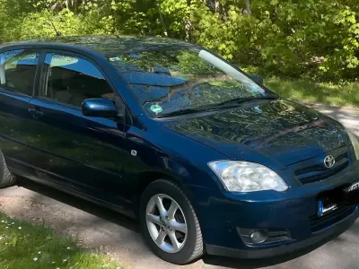 Używany Toyota Corolla 97 KM (71 kW) 2005 Niebieski Hatchback