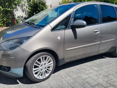 Gebraucht Mitsubishi Colt Motion 95 PS (69 kW) 2008 Gold Van / Kleinbus