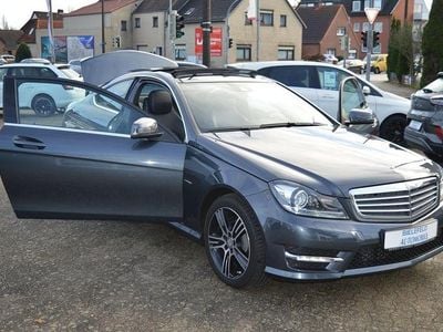 755 tenoritgrau Gebraucht 2015 Mercedes C180 AMG Coupé | 16.990 € (Superpreis)