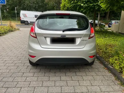 Gebraucht Ford Fiesta Celebration 82 PS (60 kW) 2013 Grau Kleinwagen