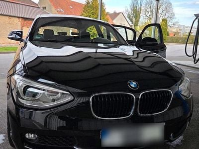 Second-hand BMW 116 136 CP (100 kW) 2014 Negru Hatchback