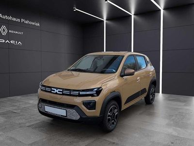 Gebraucht Dacia Spring Extreme 47 kW (65 PS) 2024 Safaribeige Kleinwagen