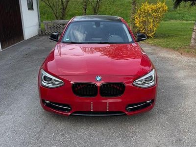 Second-hand BMW 116 Sport Line 136 CP (100 kW) 2011 Roșu Hatchback