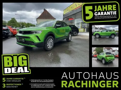 Gebraucht Opel Mokka-e Elegance 100 kW (136 PS) 2023 Lackierung matcha green/typ au SUV