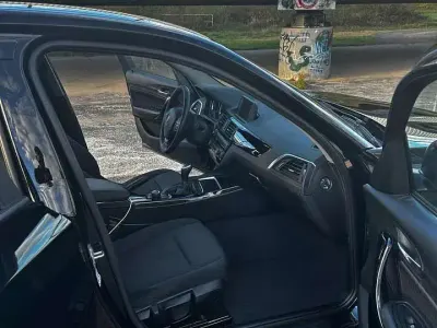 Gebraucht BMW 118 Sport Line 136 PS (100 kW) 2018 Schwarz Kleinwagen