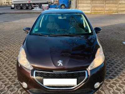 Gebraucht Peugeot 208 Active 95 PS (69 kW) 2012 Braun Kleinwagen