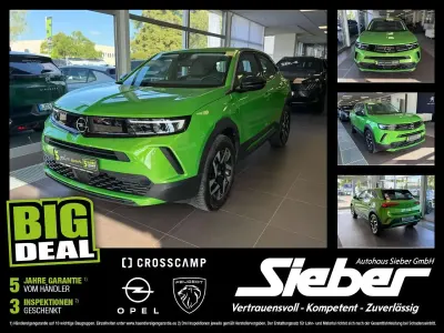 Gebraucht Opel Mokka Elegance 131 PS (96 kW) 2024 Matcha green SUV