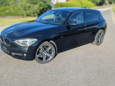 Gebraucht BMW 116 Sport Line 136 PS (100 kW) 2012 Schwarz Kleinwagen