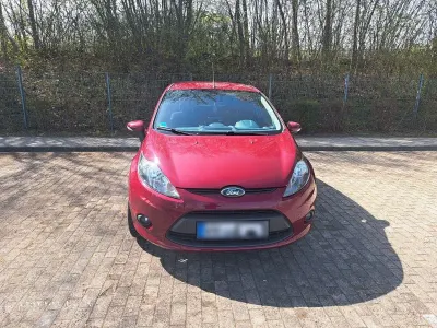 Second-hand Ford Fiesta Trend 97 CP (71 kW) 2011 Roșu Berlinǎ