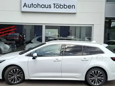 Gebraucht Toyota Corolla Hybrid Team 140 PS (102 kW) 2024 Schneeweiß Kombi