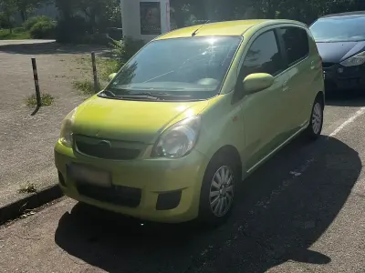 Gebraucht Daihatsu Cuore 70 PS (51 kW) 2010 Grün Kleinwagen
