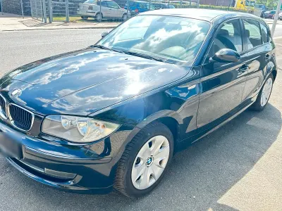 Gebraucht BMW 120 105 PS (77 kW) 2009 Schwarz Kleinwagen