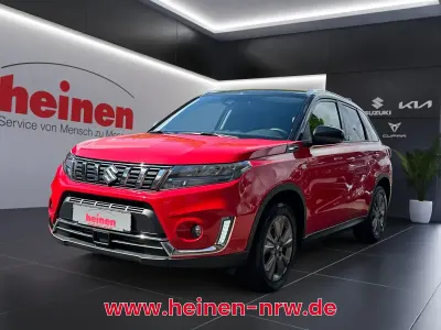 Gebraucht Suzuki Vitara Comfort 140 PS (102 kW) 2023 Bright redcosmic black SUV