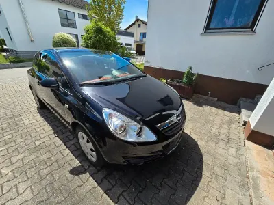 Używany Opel Corsa Edition 90 KM (66 kW) 2009 Czarny Hatchback