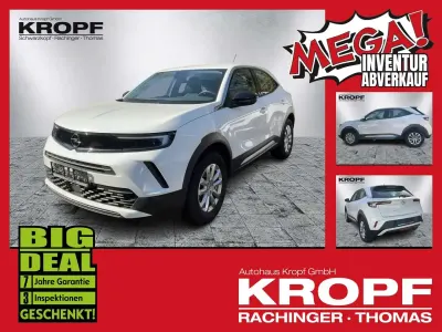 Gebraucht Opel Mokka Enjoy 131 PS (96 kW) 2023 Lack weiss banquise/typ aussen SUV