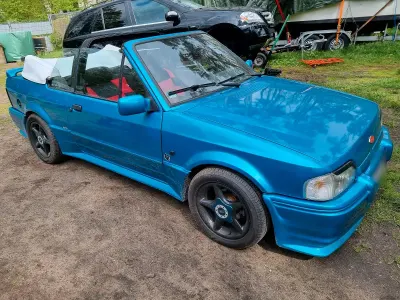 Gebraucht Ford Escort Cabriolet 102 PS (75 kW) 1989 Blau Cabrio