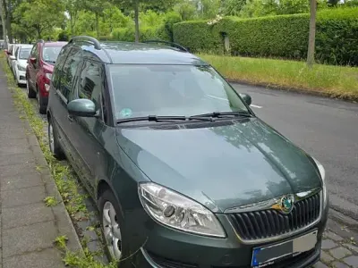 Gebraucht Skoda Roomster 86 PS (63 kW) 2013 Grün Van / Kleinbus