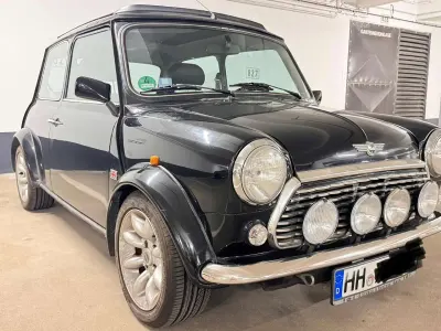 Gebraucht Rover Mini 63 PS (46 kW) 1999 Schwarz Cabrio