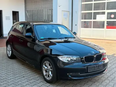 Gebraucht BMW 116 122 PS (89 kW) 2010 Schwarz Kleinwagen