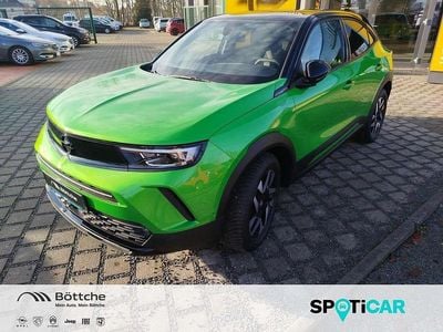 Gebraucht Opel Mokka 131 PS (96 kW) 2024 Lackierung matcha green/typ aussenverkleidung metalliclackierung SUV