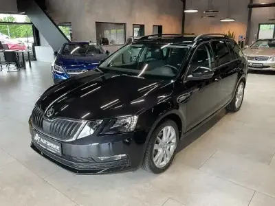 Używany Skoda Octavia Clever 86 KM (63 kW) 2018 Czarny Kombi