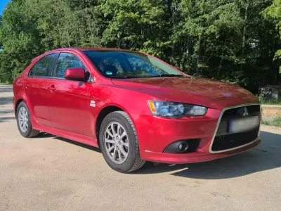 Gebraucht Mitsubishi Lancer 143 PS (105 kW) 2010 Rot Limousine