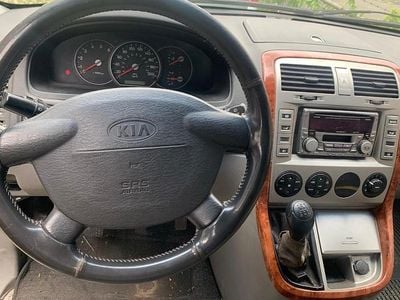 Gebraucht Kia Carnival 144 PS (105 kW) 2006 Silber Van / Kleinbus