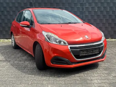 Gebraucht Peugeot 208 82 PS (60 kW) 2016 Orange Kleinwagen